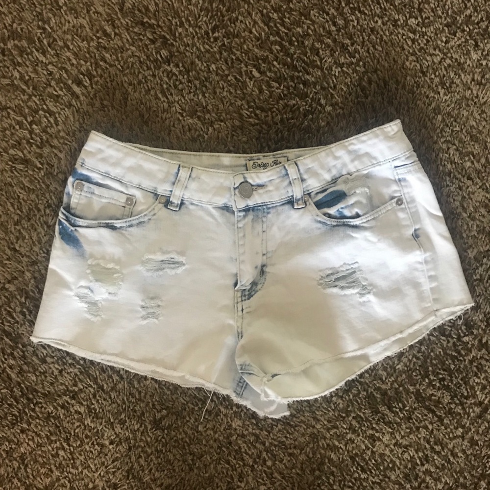 Washed out white shorts